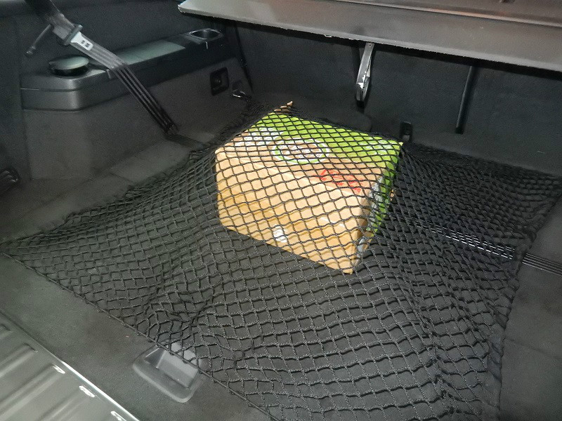 Как крепить сетку в багажнике рено дастер